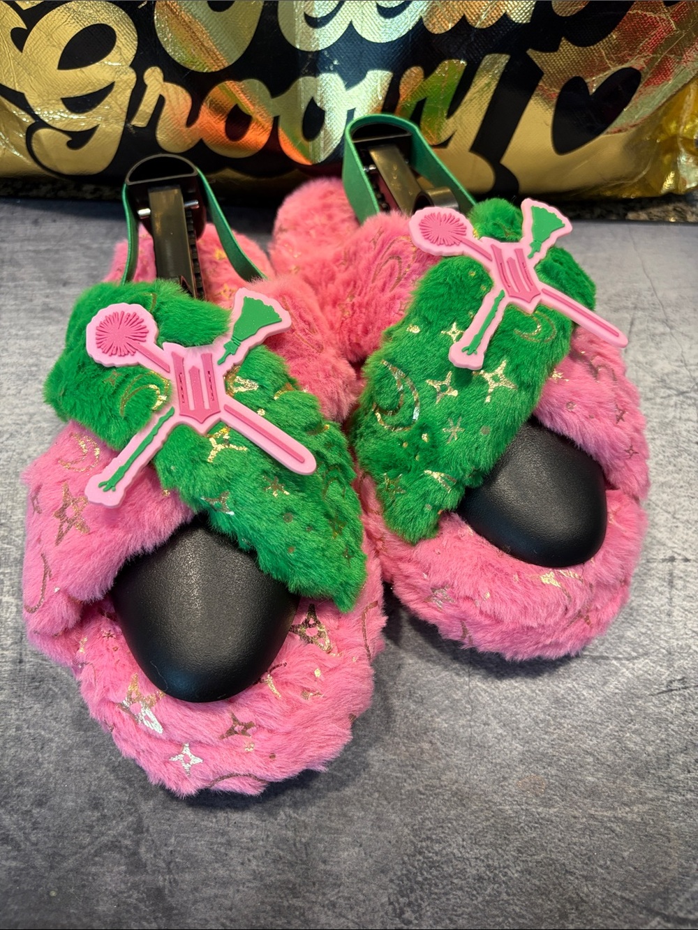 Wicked Plush Pink & Green Fuzzy Slide Sandals with Decorative Accent